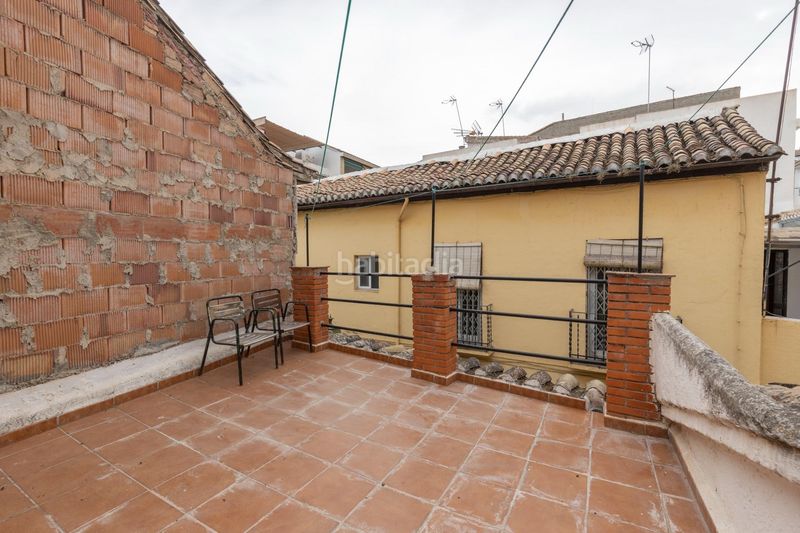 Foto 19f606ae-e2a0-4e83-86e9-04472a0cf4b9. Casa adosada en calle calle agua de cartuja 9 bonita casa para reformar en Granada
