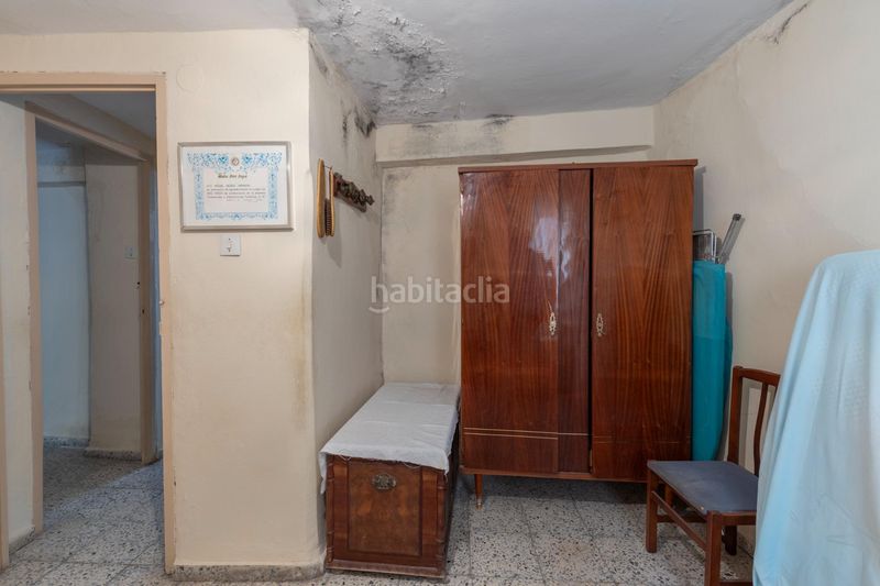 Foto 1b6417f9-45a8-4420-96ad-1256bcc29eec. Casa adosada en calle calle agua de cartuja 9 bonita casa para reformar en Granada