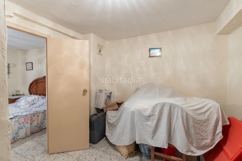 Foto 280c401a-56b9-4191-942e-53d8bbd0528a. Casa adosada en calle calle agua de cartuja 9 bonita casa para reformar en Granada