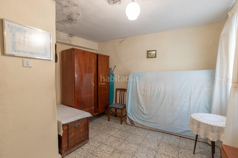 Foto d6e7565e-5122-439a-9465-63e142d3b647. Casa adosada en calle calle agua de cartuja 9 bonita casa para reformar en Granada