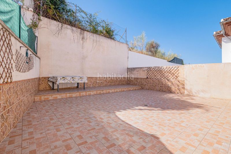 Foto 9945694f-f996-427a-b5a6-e49b38a44292. Casa aparellada amb calefacció aparcament a Jun