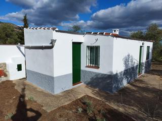 Maison à Yunquera. Terreno rústico con casa