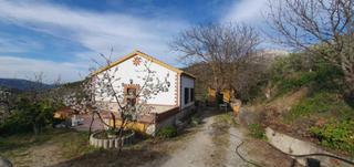 Masia a Yunquera. Finca regadío con casa