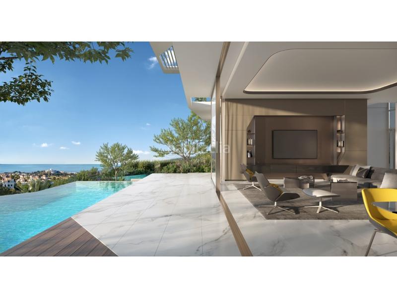 Foto 56b4c8d1-7970-4b61-bc97-ecd136e2aa3d. Casa amb aparcament piscina a Benatalaya Estepona