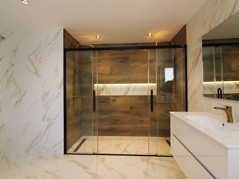 Foto 6c430629-6ebb-4850-8424-3dd14b7c40a4. Casa amb aparcament a Hacienda Torrequebrada Benalmádena