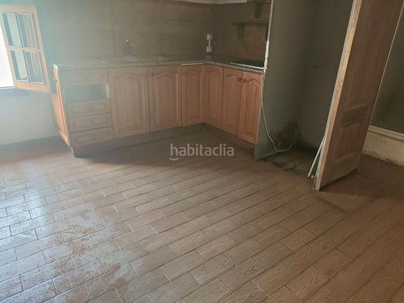 Foto 5fb10a5f-f2b7-4510-8ce1-22d3fcc410b6. Casa adossada amb xemeneia a Puigpunyent