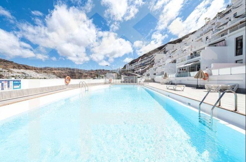 Foto 624bcdee-9b9a-4df3-aab0-29347eddb81a. Location appartement avec parking piscine dans Puerto Rico Mogán