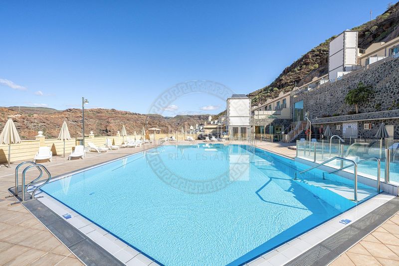 Foto b920b658-802b-4202-b2c0-a6d26f7a9b91. Lloguer casa adossada amb aparcament piscina a Puerto Rico Mogán