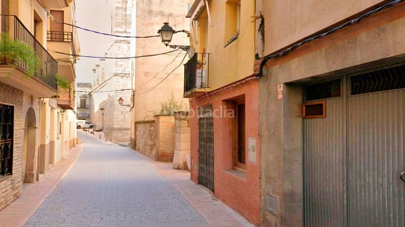 Foto 6b37a3a1-1ee9-4ab2-82ca-73c4654842bc. Local comercial a la iglesia a Cornudella de Montsant