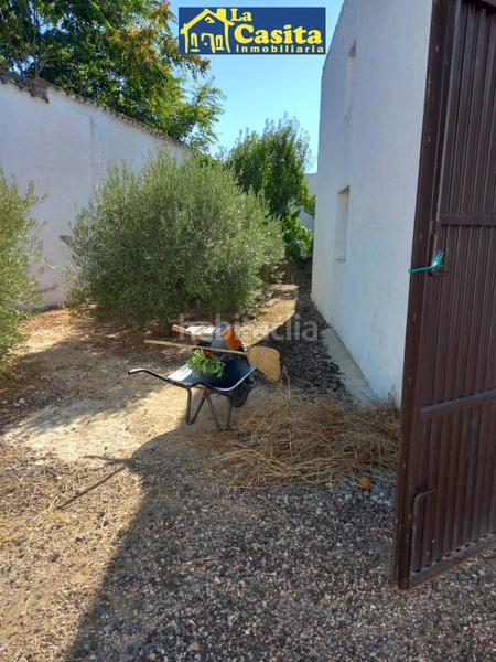 Foto f089c779-6d42-400e-bac1-80a1eac2b371. Casa con parcheggio piscina in Granátula de Calatrava