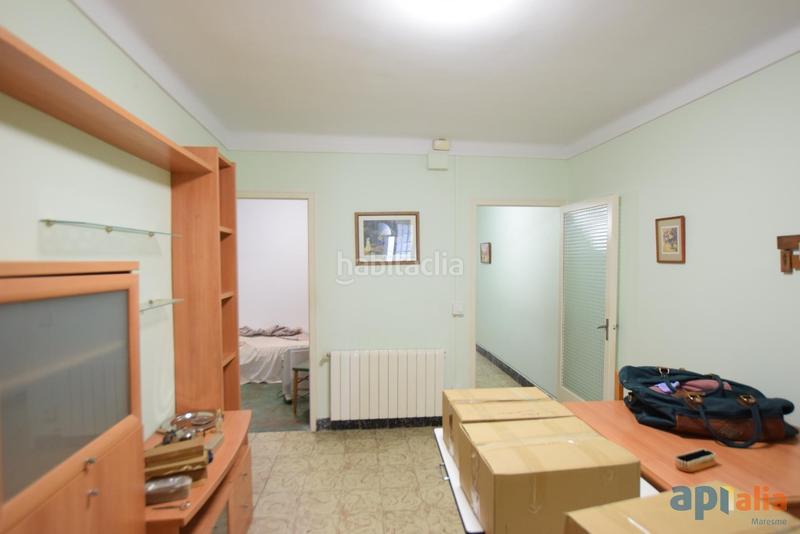 Foto 40c040ab-d370-43f7-b0d7-0e7ea8f38b47. Casa amb aparcament a Centre Mataró