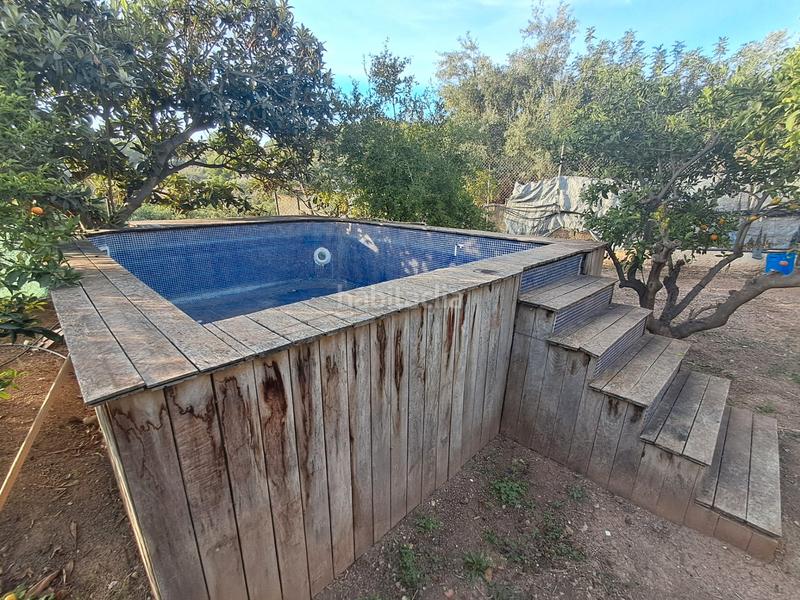 Foto 11e9ac99-f0dd-4980-8b63-a47ce095338d. Casa amb aparcament piscina a El Tossal-Bello Horizonte Nucia (la)