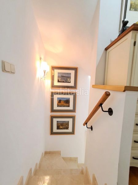 Foto b6e2af04-c8c5-45c0-8293-42eb5a64dd1d. Casa adossada amb xemeneia calefacció aparcament piscina a Nucia (la)