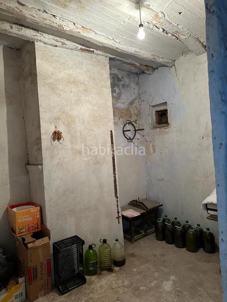 Foto ea01b481-a4ef-4f72-b39f-be3a4e3dd7b6. Casa adossada amb xemeneia a Confrides