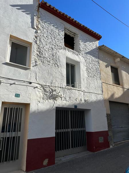 Foto f210ea3a-eea1-4d52-8fbe-08c418e77cc8. Casa adossada amb xemeneia a Confrides