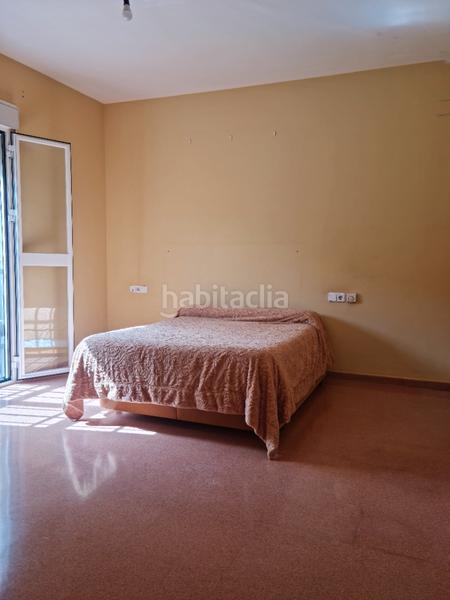 Foto 652d3da8-a158-4b75-8a1b-ad64025dd14f. Casa adossada amb calefacció a Nueva Alcalá Alcalá de Guadaira