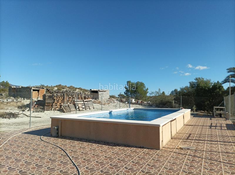 Foto f8e1b28e-6d15-4193-80ba-c8d6e1b39646. Casa en diseminado sector 5 331 campo de 7.430 m2, casa de 150m2 y piscina 8 x 4 mts !!! en Xixona