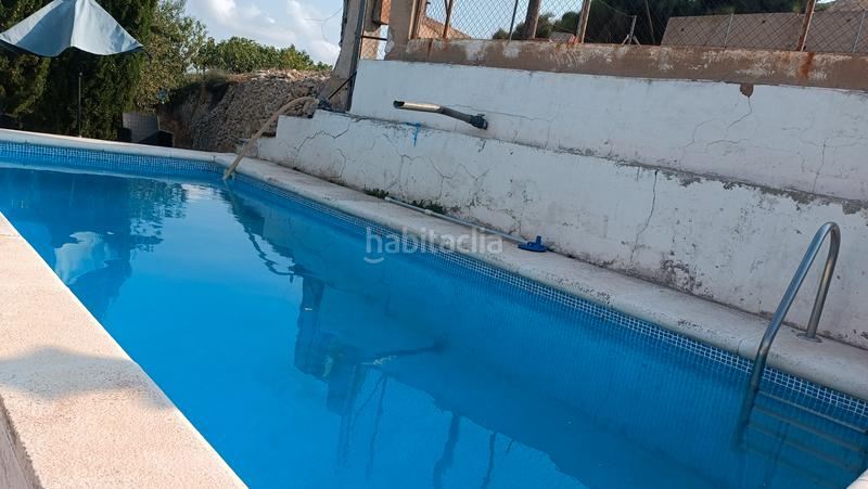 Foto 80aca408-f4ad-4a5b-9c6b-2081a3b13350. Casa  de campo con piscina a metros de jijona. en Xixona