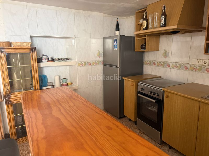 Foto 646c5033-f932-4566-93b2-b455eb1a7322. Casa adossada a Xixona