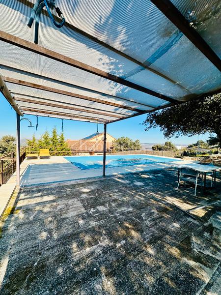 Foto 2c7830b4-083a-4131-bead-0817abd21c7e. Haus mit parking pool in Los Cigarrales-La Bastida Toledo