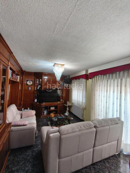 Foto 51617bd3-f527-4c98-a0ac-6ecf92ab35cc. Casa adossada amb calefacció aparcament a La Serna Fuenlabrada
