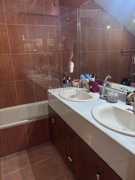 Foto e189cafc-a504-4d52-86ef-52b6631035ea. Casa adossada amb xemeneia calefacció aparcament piscina a Leganés