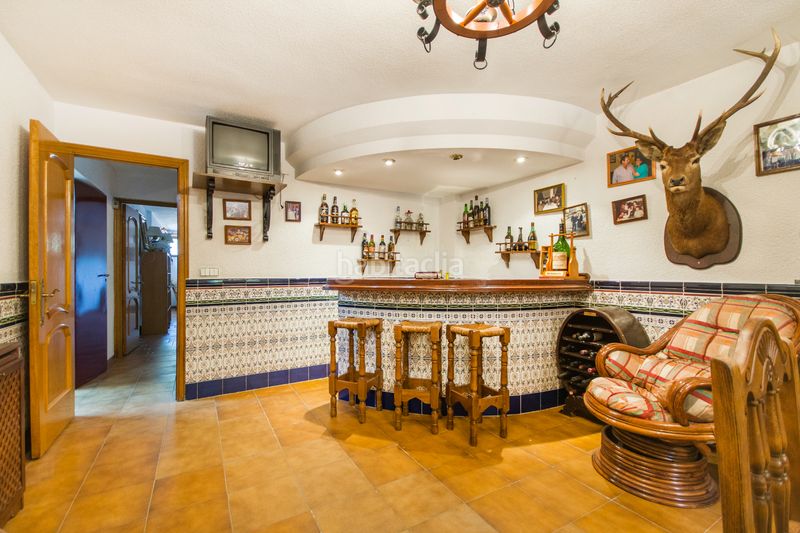 Foto c186f714-5c26-4e34-89c5-2420aca31d87. Casa adossada amb xemeneia calefacció aparcament piscina a Getafe