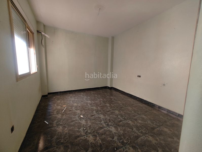 Foto f3333174-0c5c-4962-952c-cf84b4f2ec22. Casa adossada amb aparcament a Ceutí