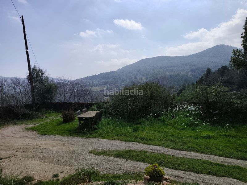 Foto 3316d14d-87ee-4705-ae15-dd029d969227. Masia amb xemeneia aparcament a Corbera de Llobregat