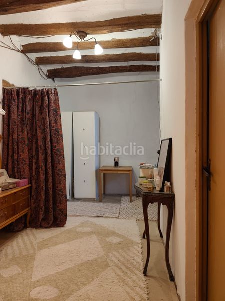 Foto 8a2c555a-9965-4beb-9928-9f03a0ceda86. Masia amb xemeneia aparcament a Corbera de Llobregat