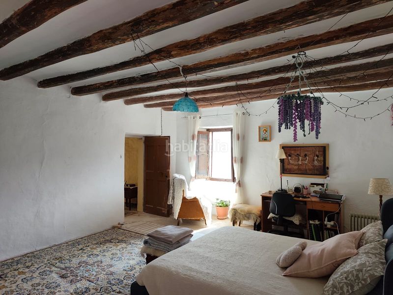 Foto 8b4e4436-20f3-45b7-bd8d-0069b388fc36. Masia amb xemeneia aparcament a Corbera de Llobregat