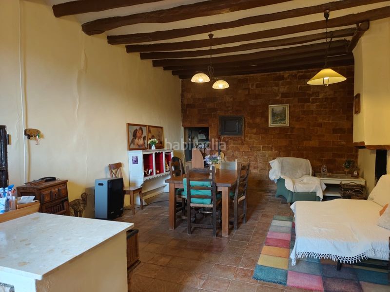 Foto c33b5b1b-9281-48ae-b60e-3487e351fd9f. Masia amb xemeneia aparcament a Corbera de Llobregat