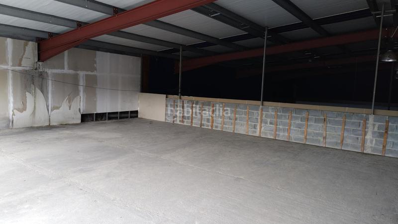 Foto 13f2f1ef-a58b-4a68-8058-054e9a63fb70. Bâtiment à usage industriel dans Llaranes Avilés