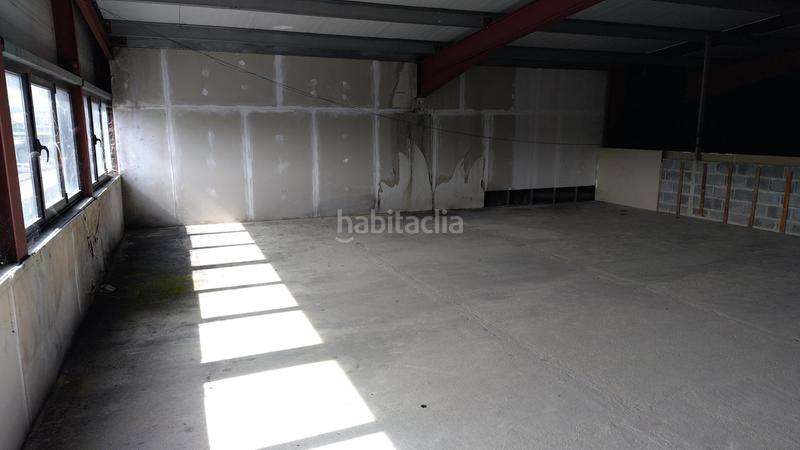 Foto d2566d38-4540-45c5-a0e2-e3efd581a324. Bâtiment à usage industriel dans Llaranes Avilés