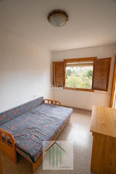 Foto 912c2e0b-504e-4d18-b1e0-054e5e90daa0. Casa adossada amb xemeneia aparcament a Torre de les Maçanes (la)