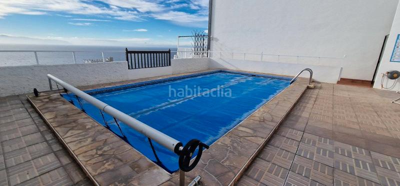 Foto 932a095e-98be-47a8-a6e7-98fe05179801. Duplex in calle geranio 8 in Acantilados de Los Gigantes Santiago del Teide