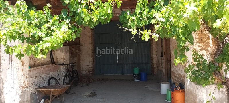 Foto 25ef2b54-da3b-48db-a334-ac19bb46cd44. Casa amb xemeneia calefacció aparcament a Matapozuelos