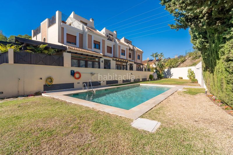 Foto 5c8b6af6-cb1a-4cc2-b105-feaa653c6cc9. Casa amb aparcament piscina a Parque Clavero Málaga