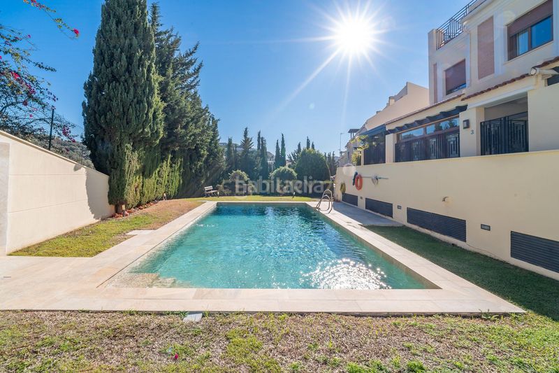 Foto ef5e88b8-389e-4cfd-a82d-85363d83ddc3. Casa amb aparcament piscina a Parque Clavero Málaga