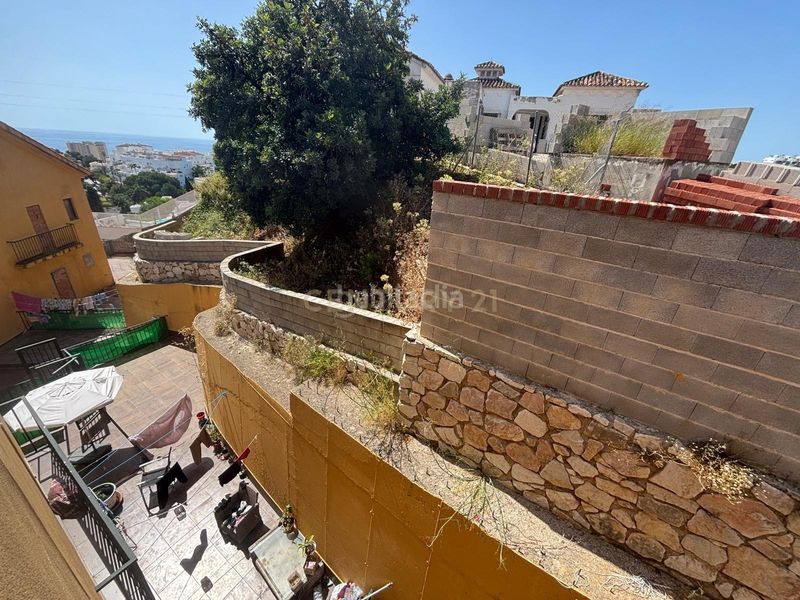 Foto 4634ef32-e0bf-44b3-8349-891544c45bcc. Casa adossada amb aparcament a Torreblanca del Sol Fuengirola
