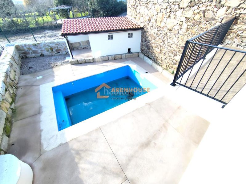 Foto d8a8c0d9-b1aa-4a51-bf88-02421d597971. Chalet avec chauffage dans Merca (A)