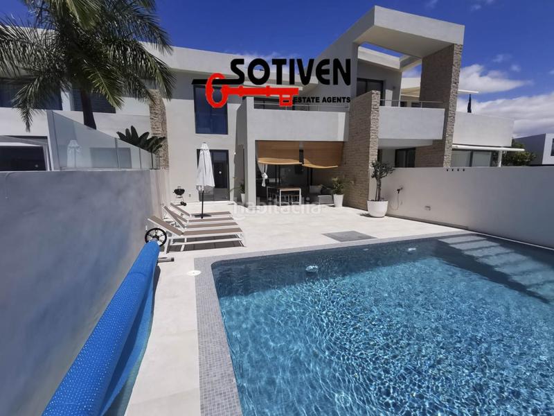 Foto a9a7c5a1-bd6a-4513-b6ba-abbd647b9a6f. Maison jumelée dans La Caleta Adeje