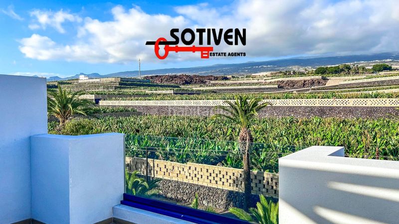 Foto b3081a7c-ed0e-4adf-a399-ed0bab5f5474. Casa adossada amb aparcament a Playa de San Juan Guía de Isora