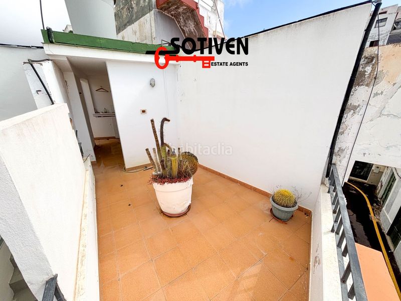 Foto c597eb77-add1-4191-a707-a1ce69aac261. Casa amb aparcament a Guía de Isora interior Guía de Isora