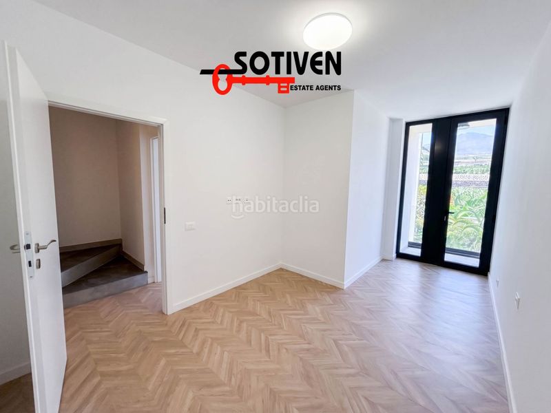 Foto a52b63cf-c4cd-4ae8-8392-42c061e7d5bf. Casa adossada amb aparcament a Playa de San Juan Guía de Isora