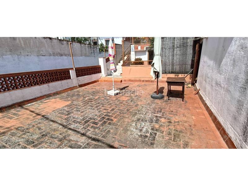 Foto 61c7d574-bc10-42ce-b23e-dcf2107ddf3b. Casa  en singuerlin en Guinardera Santa Coloma de Gramenet