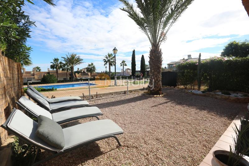 Foto 10e37a1e-1df1-414e-ada6-6658a56ed598. Casa aparellada a avenida bélgica 32 a Hacienda del Álamo Golf Fuente Álamo de Murcia