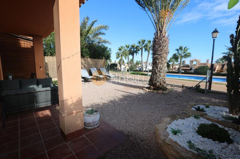 Foto a6c14c6c-c0ed-4acd-84cb-00f36839f875. Casa aparellada a avenida bélgica 32 a Hacienda del Álamo Golf Fuente Álamo de Murcia