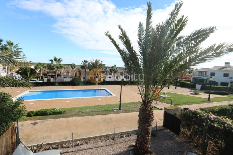 Foto b4c66d98-967a-41f0-8ef9-170b16cb1be6. Casa aparellada a avenida bélgica 32 a Hacienda del Álamo Golf Fuente Álamo de Murcia