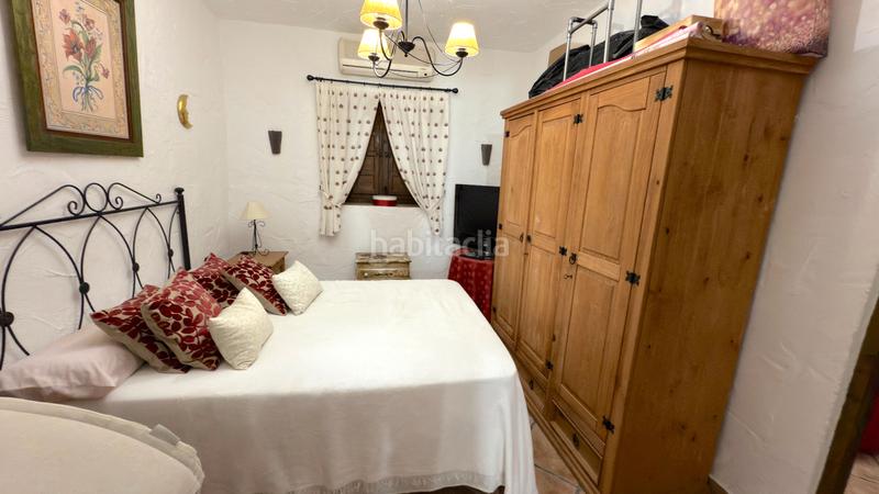 Foto 195ca2e7-7d1f-437a-a9de-9db0e26fdc9d. Affitto casale con camino piscina in Benamocarra